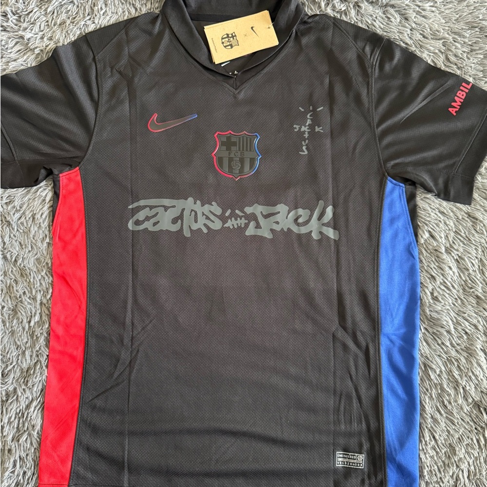 Nike Black Soccer Jersey with Red and Blue Stripes